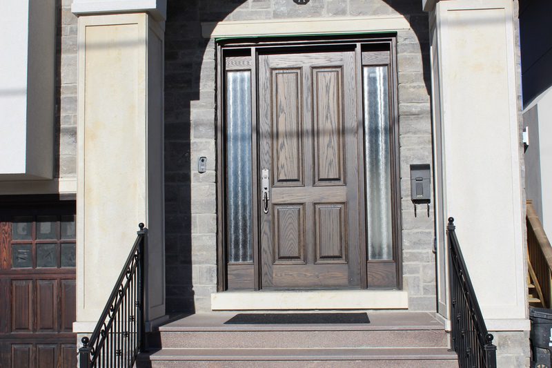 Classic wood single door with glass on corners and top