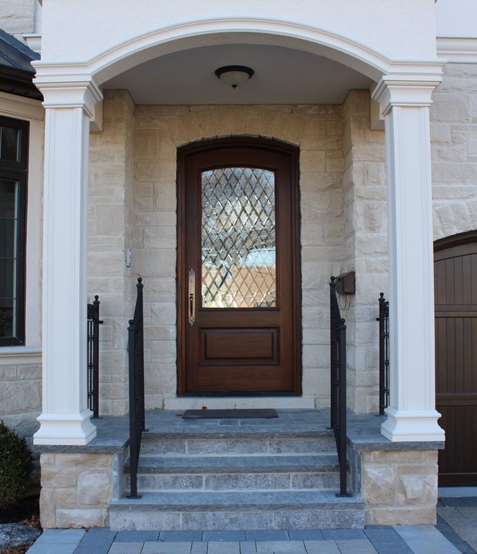 Classic single wood door with glass and grill on the door