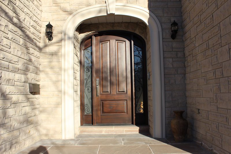 Standard wood single door with glass on corners and top