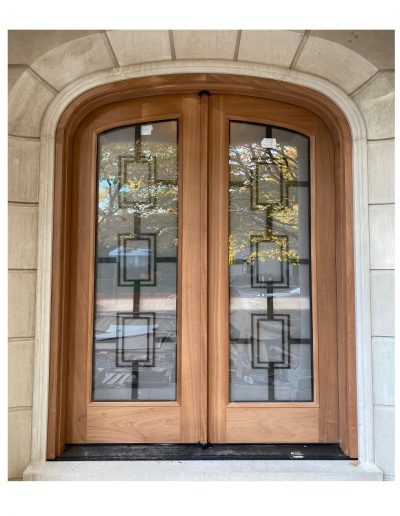 Transitional raw wood double door