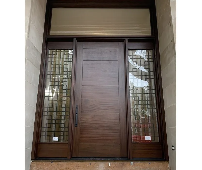 Modern Flat Dark Brown Wood Exterior Door with sidelits, decorative iron transom and horizontal grooves