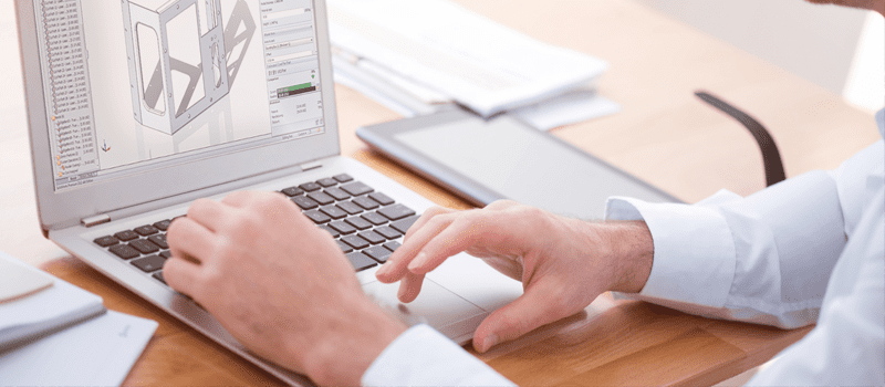 Man placing finger on Keyboard
